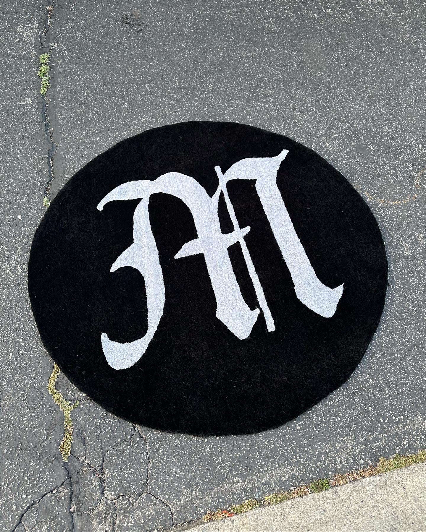 Circle Rug w/ a custom letter.