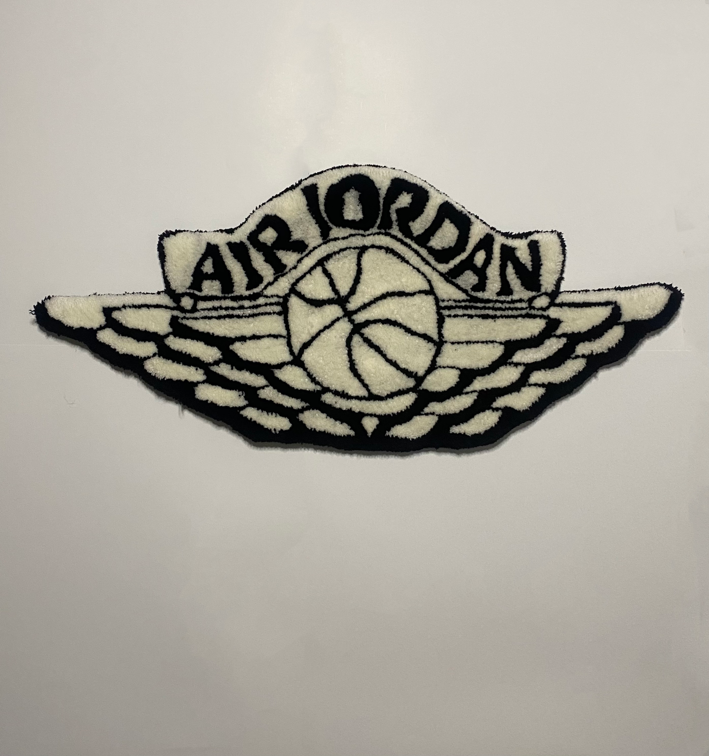 Jordan Emblem Rug..Hand Tufted